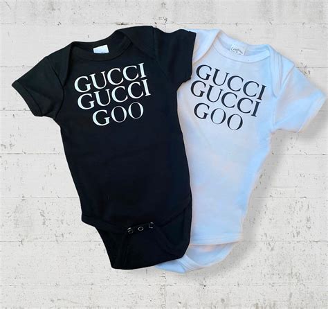 gucci print onesie